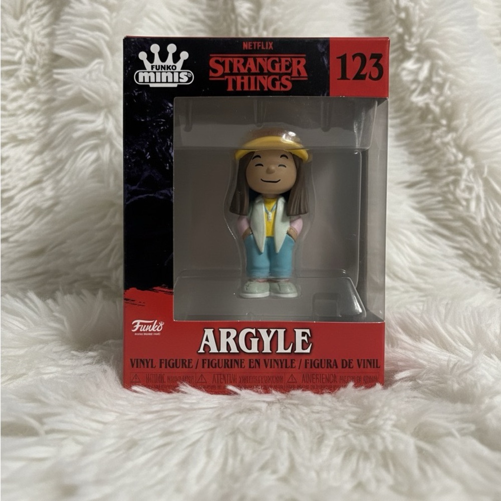 Funko Argyle Figure with Yellow Hat and Blue Pants